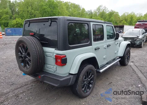 2023 Jeep Wrangler 4Xe Sahara 4X4 z USA, uszkodzony, nr VIN 1C4JJXP64PW683655